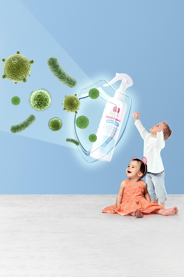 Cute baby enjoying a refreshing bath with water pouring down, creating a joyful moment.